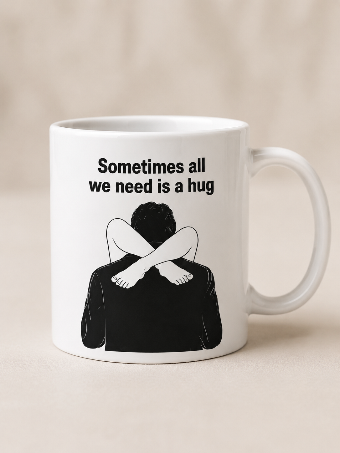 White coffee mug with Sometimes all we need is a hug design